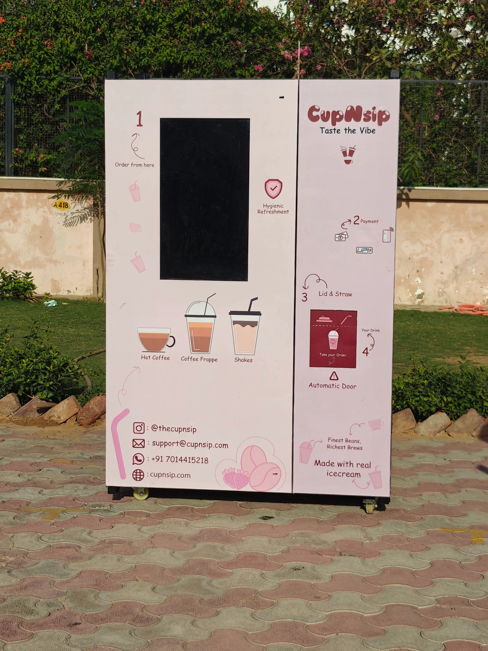 Front view of the real Cupnsip automated beverage vending machine